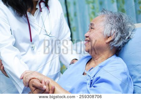 Doctor Holding Touching Hands Asian Senior Or Elderly Old Lady Woman Patient With Love, Care, Helpin