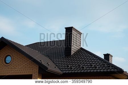 Brown Metal Tile Roof. Roof Metal Sheets. Modern Types Of Roofing Materials. Roof Of The House, Meta