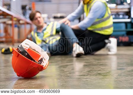 Selective Focus At Hat, Men Worker Feel Painful And Hurt From The Accident That Happen Inside Of Ind