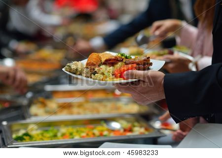 people group catering buffet food indoor in luxury restaurant with meat colorful fruits  and vegetables