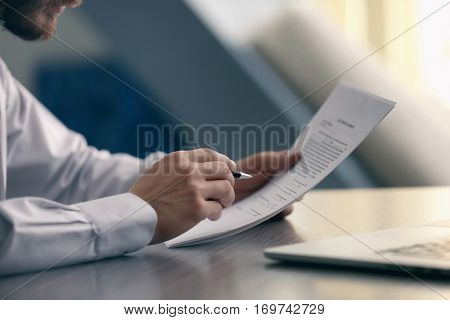 Businessman reading documents