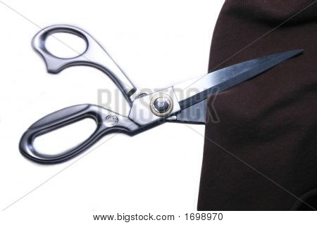 Taylor Scissors Cutting A Piece Of Cloth