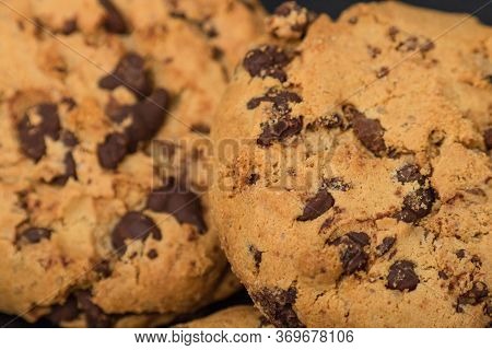 Texture Of Cookie With Chocolate. Close Up Of Chocolate Chip Cookies, Stacked Chocolate Chip Cookies