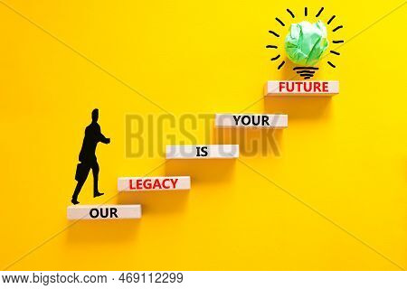 Legacy And Future Symbol. Concept Words Our Legacy Is Your Future On Wooden Blocks. Beautiful Yellow