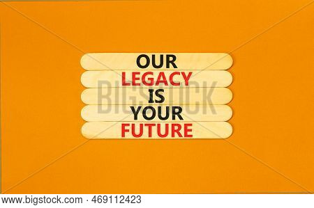 Legacy And Future Symbol. Concept Words Our Legacy Is Your Future On Wooden Stick. Beautiful Orange 