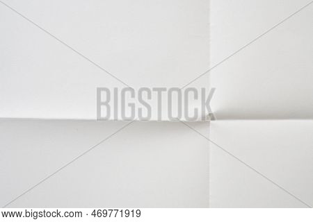 White Folded And Wrinkled Paper Texture Background