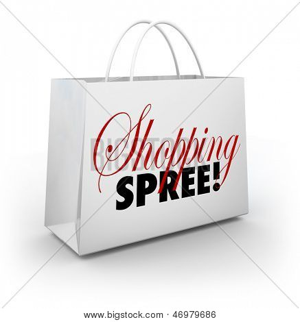 The words Shopping Spree on a white bag for carrying your merchandise at a store or mall as you spend money on goods and products