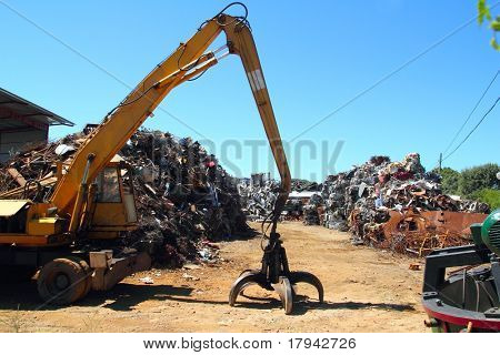 scrap metal scrap-iron junk outdoor with crane