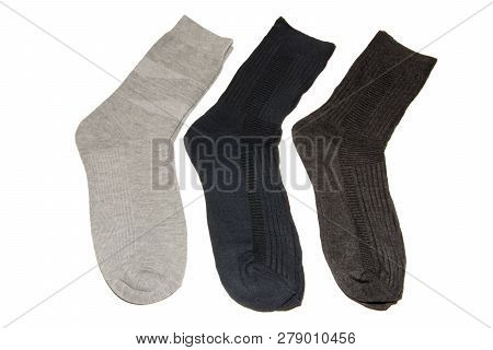 Three Pairs Of Multi-colored Thin Socks. Thin, Summer Running Socks. Isolated On White Background.