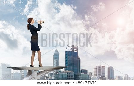 Hand of waiter presenting on tray woman playing fife