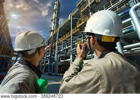 Industrial Engineer Or Worker Radio Communication To The Control Room At Oil And Gas Refinery Plant 