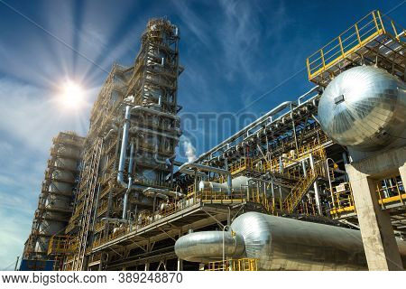 Close Up Industrial View At Oil And Gas Refinery Plant Form Industry Zone With Sunrise And Cloudy Sk