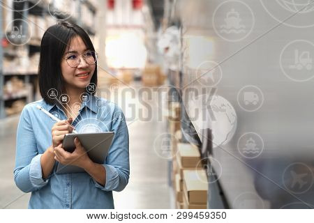 Young Attractive Asian Manager Woman Looking, Picking, Replemishment, Receiving Inventory At Store W