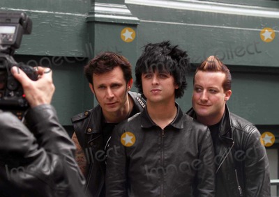 Michael Ryan Photo - New York NY 5-16-09 EXCLUSIVEThree time Grammy Award winning group Green Day (Billy Joe Armstrong (c) Tres Cool (Frank Edwin Wright III) (r) and Michael Ryan Pritchard (Dirnt) (l) jump out of a van for a quick private photo shoot wih their own photographer outside the Prada store in SoHoEXCLUSIVE Digital photo by Jamie Scull-PHOTOlinknet