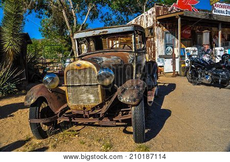 HACKBERRY, ARIZONA, USA - MAY 15: A vintage car left abandoned near the Hackberry General Store. Hackberry General Store is famous stop on the historic Route 66.