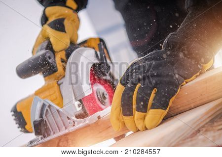 Lumber Woodwork Tools. Wood Construction. Circular Saw in Action.