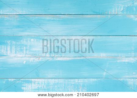 Blue wood texture background surface with old natural pattern or old wood texture table top view. Grunge surface with wood texture background. Vintage timber texture background. Rustic table top view.