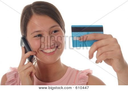 Girl With Credit Card And Mobile Phone