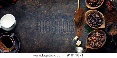 Top view of three different varieties of coffee beans on dark vintage background