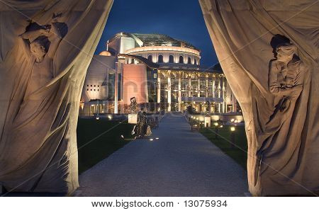 This is the new bulding of the Hungarian National Theater. It stands in Budapest on the riverbank of Danube.