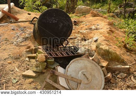 Old Wood Stove With Fallen Pot - Image