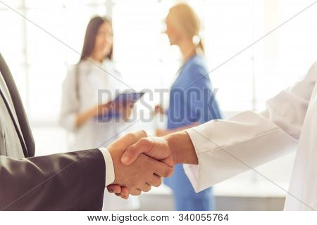 Health Concept - Doctor, Hospital With Health Related Graphic. Healthcare People, Medical Treatment,