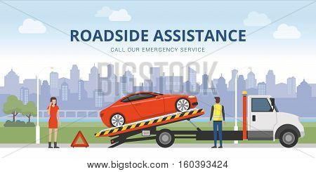 Roadside assistance and car insurance concept: broken car on a tow truck and woman calling emergency services