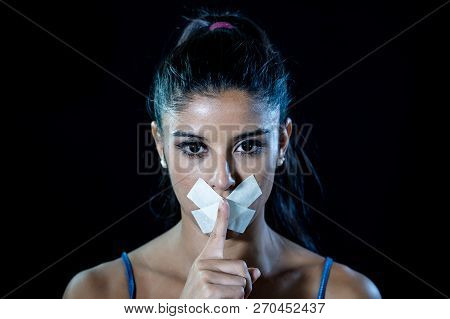 Attractive Young Woman Mouth Sealed On Adhesive Tape And Silence Gesture