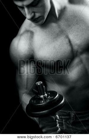 Bodybuilding - Muscular Man And Dumbbell Workout