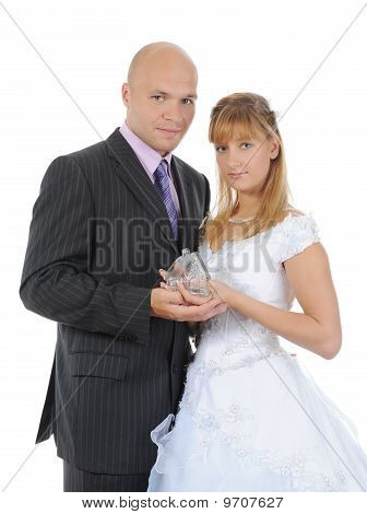 Doll House In The Hands Of The Newlyweds.