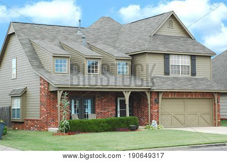 Midwest house with new roof and beautiful windows and new paint