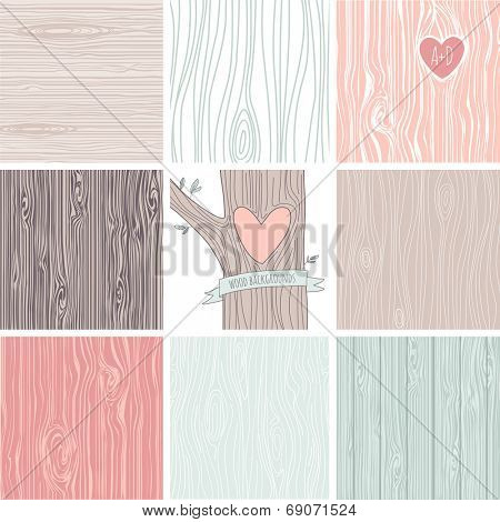 Woodgrain, wooden texture background and a carved heart in a tree, perfect as wedding backgrounds and valentines day cards