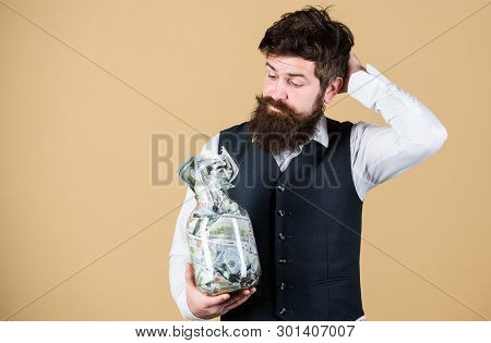 What Is A Good Way Of Investing Money. Bearded Man Thinking Of Investing Money Into Business. Busine