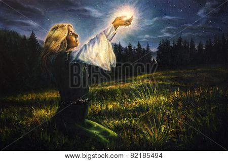 Beautiful Mystical Young Woman In Green Emerald Medieval Dress Is Holding A Glowing Ball Of Light In