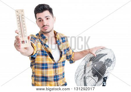 Attractive Man With Thermometer Use Electric Fan To Cool Down