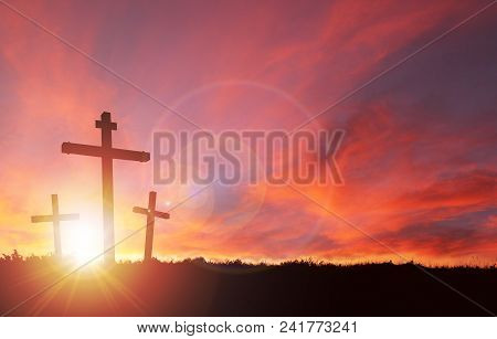 A Silhouette Of The Crucifixion Of Jesus Christ On A Cross With 2 Other Robbers Against A Dramatic S