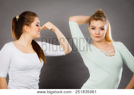 Woman Having Wet Armpit Her Friend Smelling Stink Being Disgusted. Hyperhidrosis Sweat, Health Socia