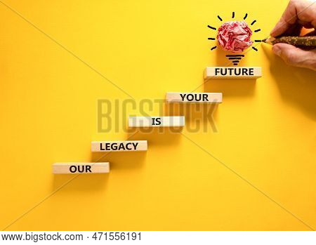 Legacy And Future Symbol. Concept Words Our Legacy Is Your Future On Wooden Blocks. Beautiful Yellow