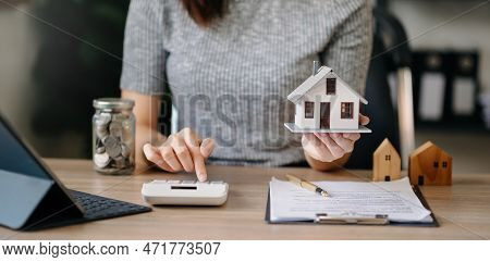 Considering Buying A Home, Investing In Real Estate. Broker Signs A Sales Agreement. Agent, Lease Ag