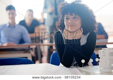 portrait of young female student at school classroom