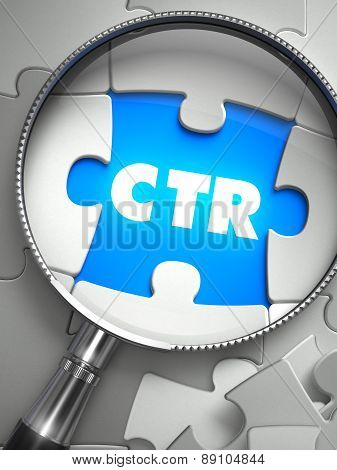 CTR - Puzzle with Missing Piece through Loupe.