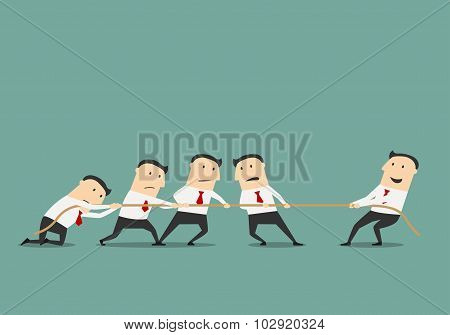 Businessman tug of war with group