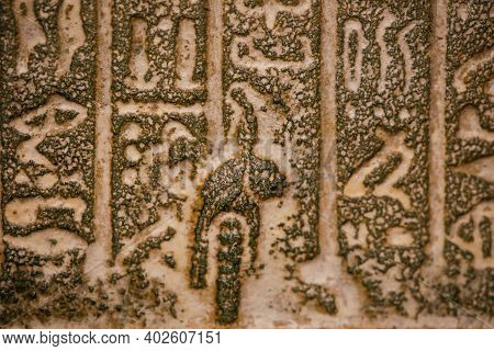 Shallow Depth Of Field (selective Focus) And Close Up Footage With Egyptian Hieroglyphs On A Histori