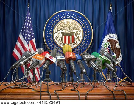 Federal Reserve System Fed of USA press conference concept. Microphones TV and radio channels with symbol and flag of US Federal Reserve. 3d illustration