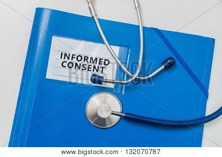 Blue folder with Informed Consent documents. Medicine concept.