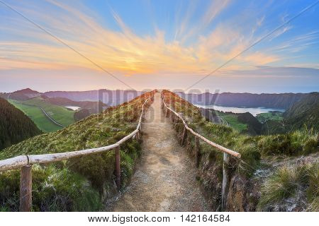 Mountain landscape with hiking trail and view of beautiful lakes, Ponta Delgada, Sao Miguel Island, Azores, Portugal.