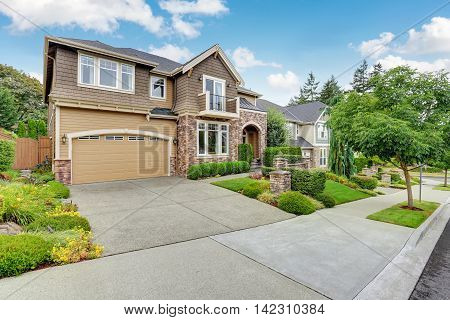 Beautiful Curb Appeal Of American House With Stone Trim