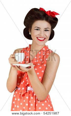 Portrait of pin-up style woman with a cup of coffee