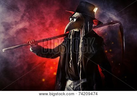 Portrait of a terrible plague doctor with a scythe. Medieval Europe. Halloween.