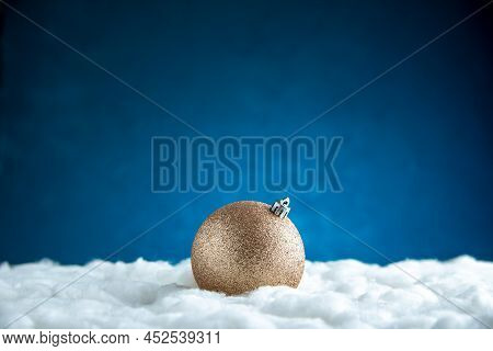 Front View Xmas Tree Ball On Blue Isolated Background Free Space Xmas Photo